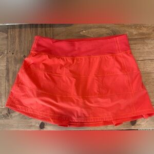 Lululemon Athletica mid rise orange skirt - size 8